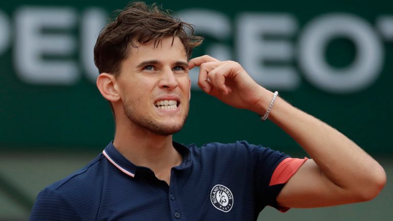 Austria's Dominic Thiem reacts after a point against Germany's Alexander Zverev during their men's singles quarter-final match on day ten of The Roland Garros 2018 French Open tennis tournament in Paris on June 5, 2018