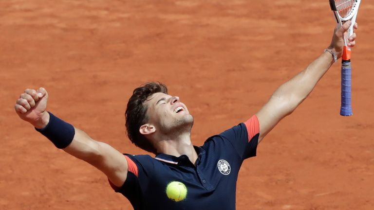 Austria's Dominic Thiem celebrates after victory over Japan's Kei Nishikori during their men's singles fourth round match on day eight of The Roland Garros 2018 French Open tennis tournament in Paris on June 3, 2018.