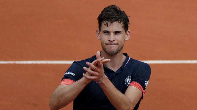 Austria's Dominic Thiem celebrates after victory over Germany's Alexander Zverev at the end of their men's singles quarter-final match on day ten of The Roland Garros 2018 French Open tennis tournament in Paris on June 5, 2018. (