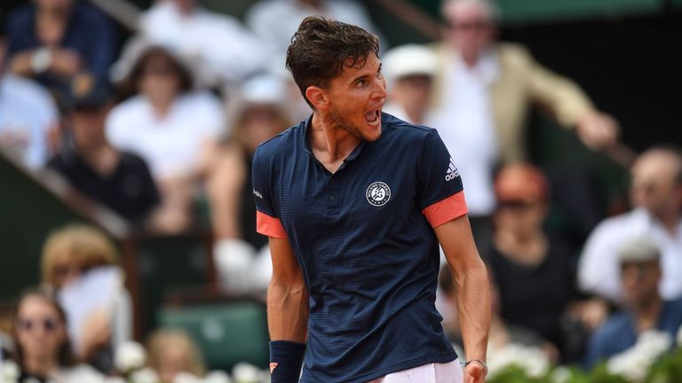 Austria's Dominic Thiem reacts during his men's singles final match against Spain's Rafael Nadal on day fifteen of The Roland Garros 2018 French Open tennis tournament in Paris on June 10, 2018. (