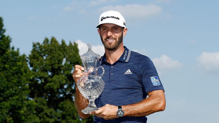 MEMPHIS, TN - JUNE 10:  Dustin Johnson poses with the trophy after the final round of the FedEx St. Jude Classic at TPC Southwind on June 10, 2018 in Memphis, Tennessee.  (Photo by Andy Lyons/Getty Images)