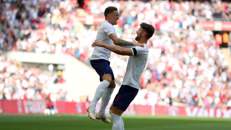Gary Cahill celebrates scoring England's first goal with Kieran Trippier against Nigeria