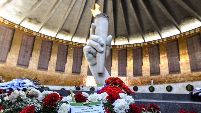 wreaths and flowers laid by England's national football team supporters in the 'Hall of Military Glory' at the Mamayev Kurgan World War Two memorial complex in Volgograd