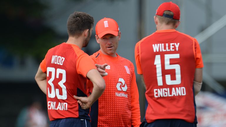 EDINBURGH, SCOTLAND - JUNE 10 : Eoin Morgan of England speaks to Mark Wood and David Willey during the One-Day International match  between Scotland and England at Grange cricket club ground on June 10, 2018 in Edinburgh, Scotland. (Photo by Philip Brown/Getty Images)