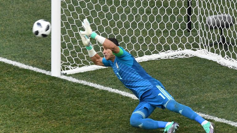 Essam El-Hadary, the oldest ever player to compete in the World Cup, saves a penalty from Fahad Al-Muwallad