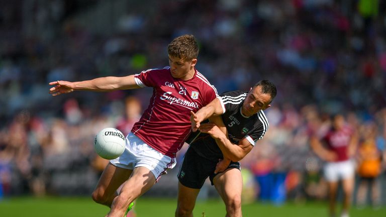 Michael Daly of Galway in action against Neil Ewing of Sligo