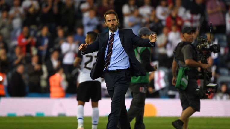 England's manager Gareth Southgate celebrates on the pitch after the International friendly football match between England and Costa Rica at Elland Road, Leeds in northern England on June 7, 2018. - England won the game 2-0