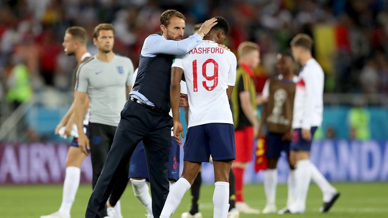 Gareth Southgate consoles Marcus Rashford after the 1-0 loss to Belgium