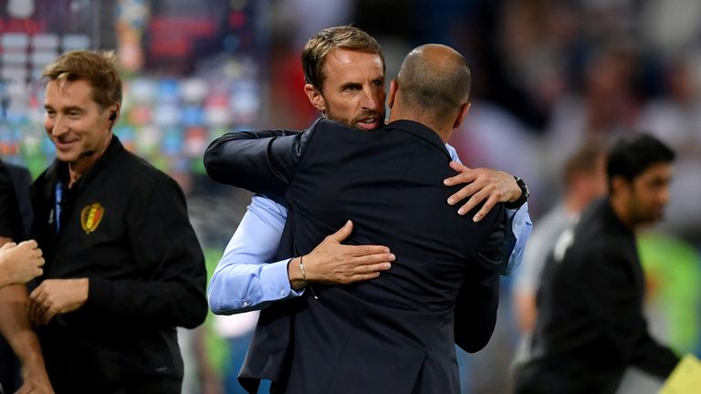 Gareth Southgate embraces Roberto Martinez after the group G match between England and Belgium at Kaliningrad Stadium