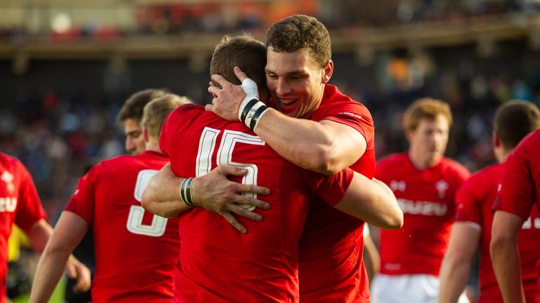 Hallam Amos (L) and George North celebrate a Wales try 