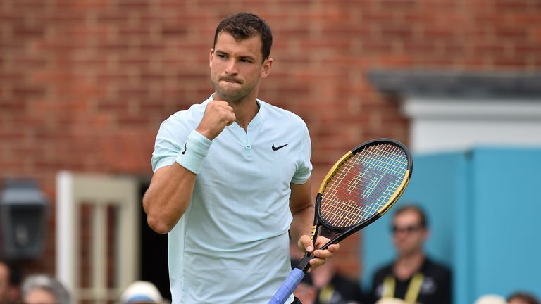 Bulgaria's Grigor Dimitrov reacts after winning a point against Bosnia and Herzegovina's Damir Dzumhur during their first round men's singles match at the ATP Queen's Club Championships tennis tournament in west London on June 19, 2018.