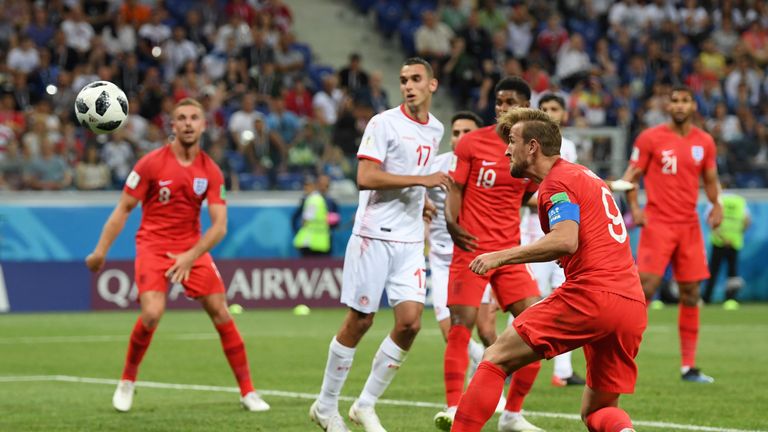 Harry Kane heads a late winner for England