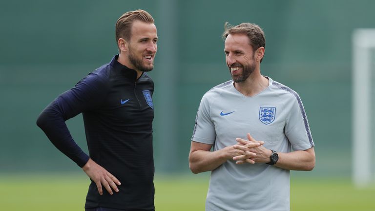 Gareth Southgate and Harry Kane appear relaxed during training