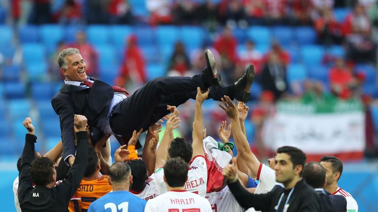 Carlos Queiroz celebrates with Iran after their World Cup win against Morocco