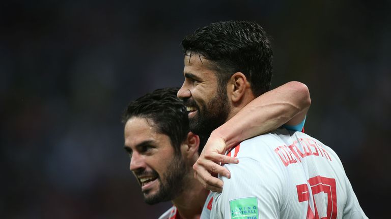 Isco celebrates with Diego Costa after Spain's goal