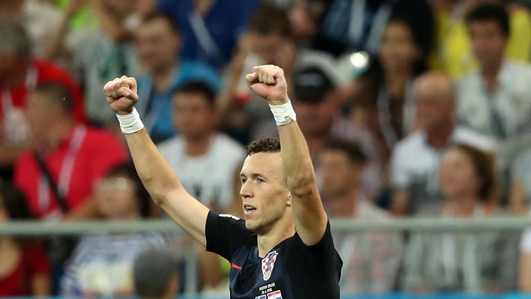 Ivan Perisic celebrates scoring Croatia's late second goal, which sealed a 100 per cent record in Group D
