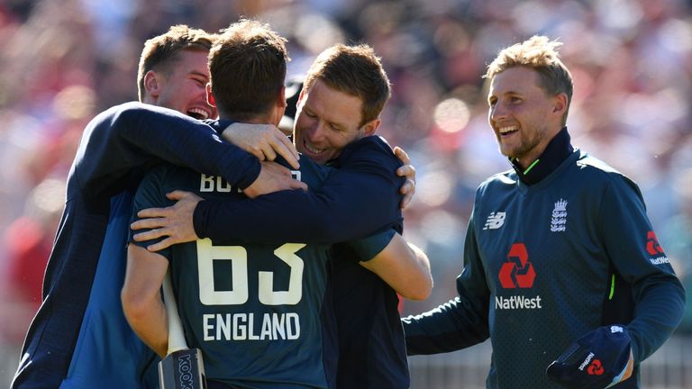 England players congratulate Jos Buttler after his match-winning century against Australia at Old Trafford