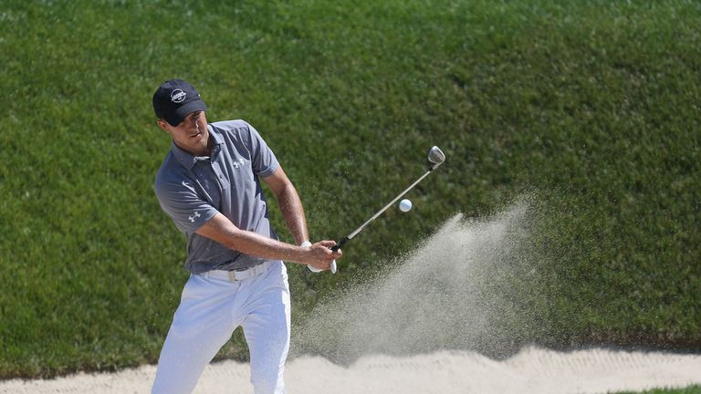 Spieth holed out from the bunker for eagle at the sixth