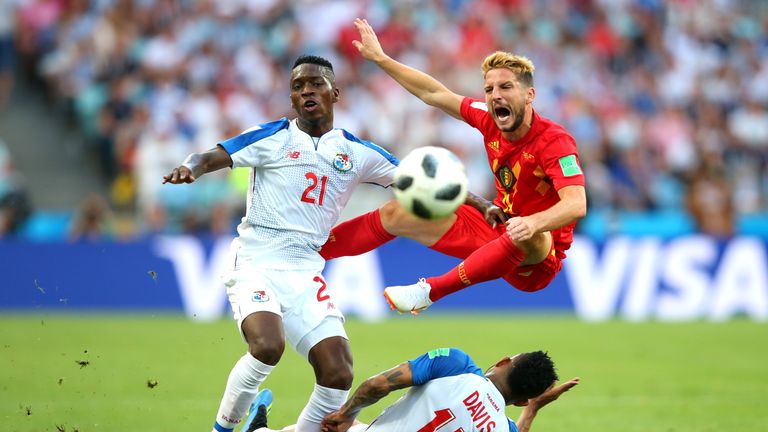 Jose Luis Rodriguez and Eric Davis (not pictured) clash with Dries Mertens during the group G match between Belgium and Panama