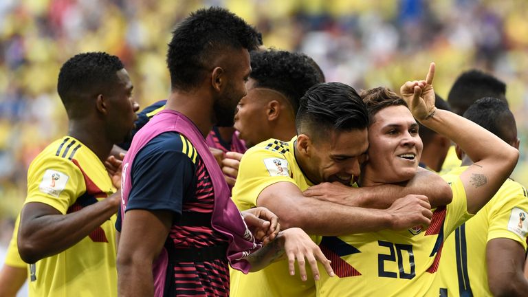 Juan Quintero celebrates with Radamel Falcao after scoring for Colombia