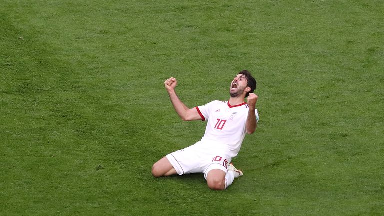 Karim Ansarifard of Iran celebrates victory after the 2018 FIFA World Cup Russia group B match between Morocco and Iran at Saint Petersburg Stadium on June 15, 2018 in Saint Petersburg, Russia.