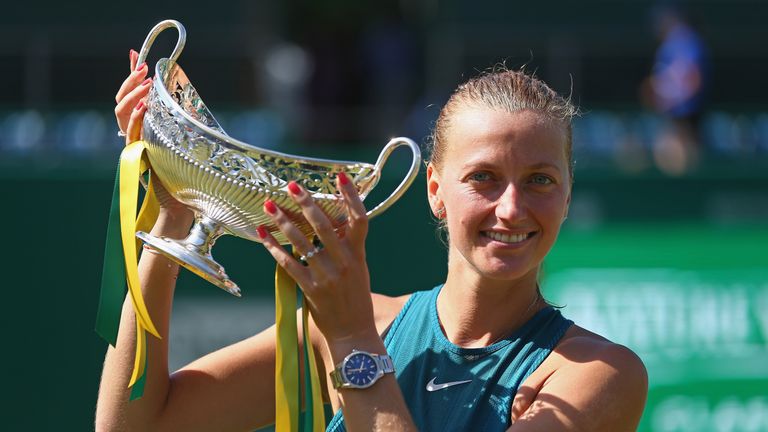 Petra Kvitova holds aloft her trophy after a three-set victory in Birmingham