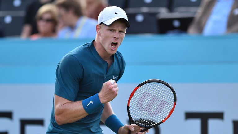 Britain's Kyle Edmund reacts to America's Ryan Harrison during his first round men's singles match at the ATP Queen's Club Championships tennis tournament in west London on June 19, 2018