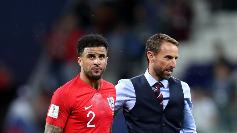 Gareth Southgate with Kyle Walker at the final whistle of the group G match against Tunisia