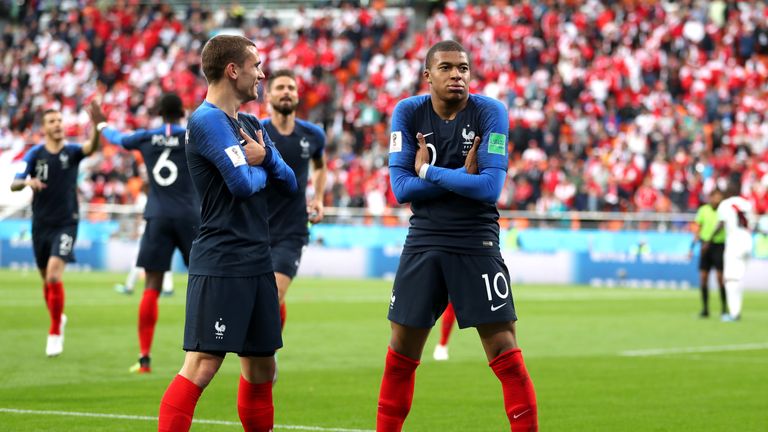 Kylian Mbappe celebrates scoring the opening goal of the game with team-mate Antoine Griezmann