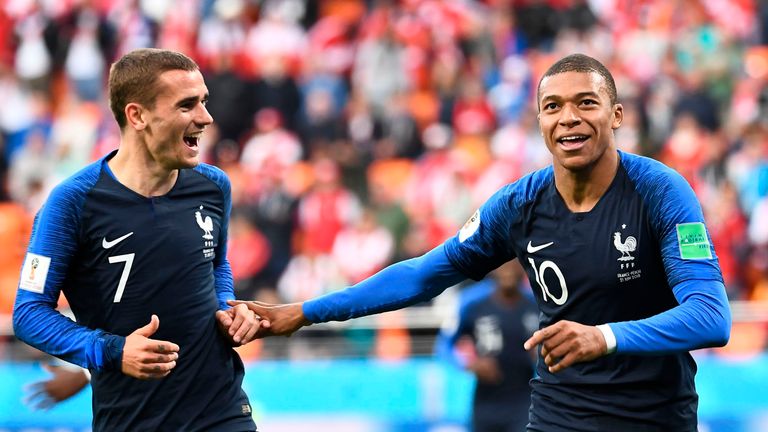 Kylian Mbappe celebrates scoring the opening goal with his team-mate Antoine Griezmann