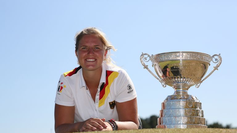 SOUTHPORT, ENGLAND - JUNE 30: Leonie Harm of Germany with the trophy after winning the final on day five of The Ladies' British Open Amateur Championship at Hillside Golf Club on June 30, 2018 in Southport, England. (Photo by Julian Herbert/R&A/R&A via Getty Images)