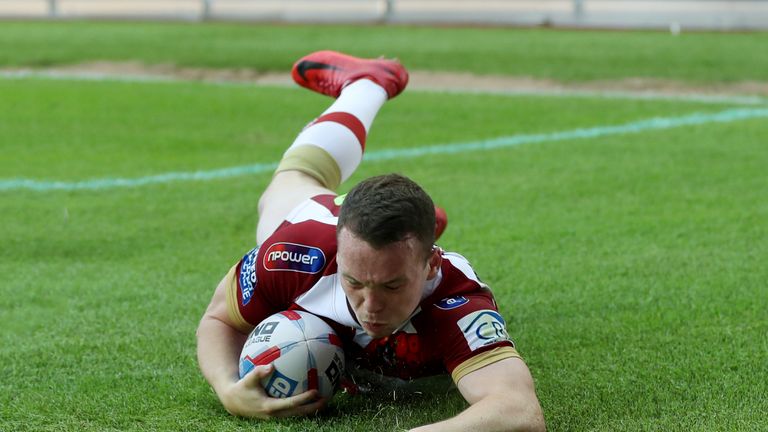 Liam Marshall scores Wigan's second try against Leeds