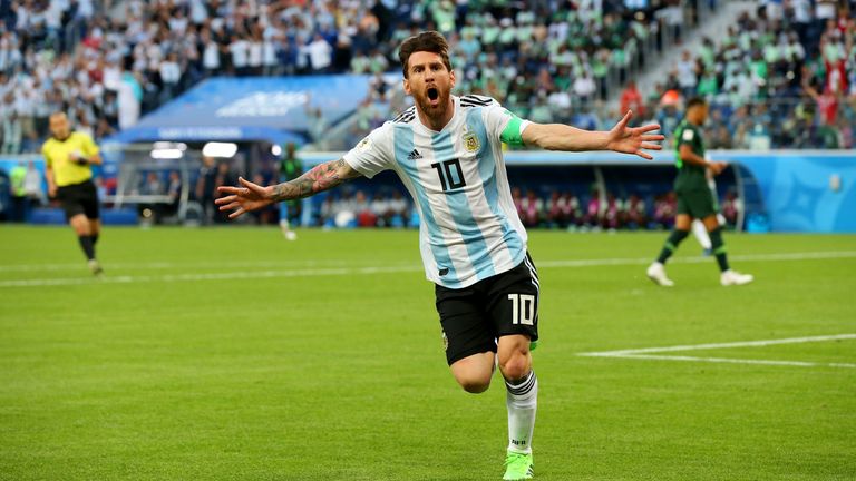 Lionel Messi celebrates after scoring Argentina&#39;s first goal against Nigeria