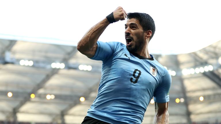 Luis Suarez celebrates his opener during the group A match between Uruguay and Saudi Arabia