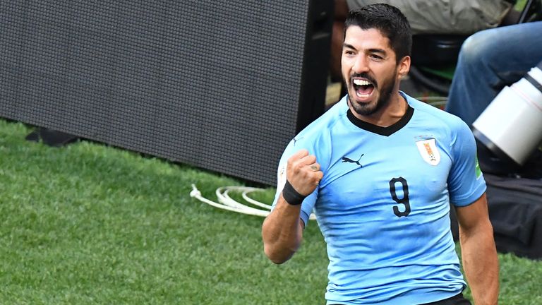 Luis Suarez celebrates after putting Uruguay ahead