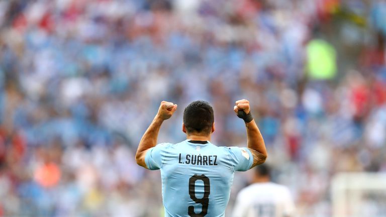 Luis Suarez celebrates after scoring Uruguay's first goal