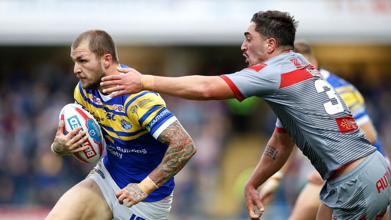 Leeds Rhinos' Luke Briscoe is tackled by Catalans Dragons' Tony Gigot