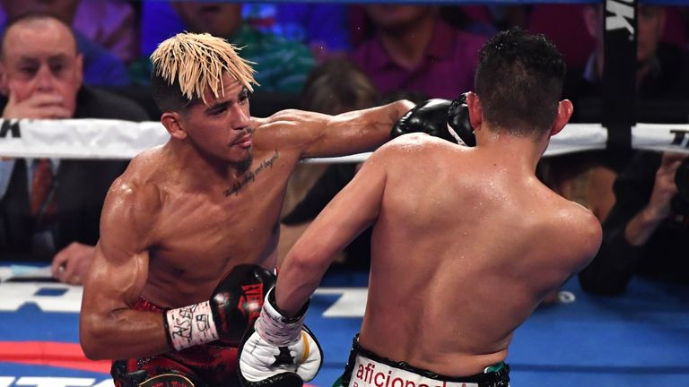 Nonito Donaire and Jessie Magdaleno in the xx round of their WBO junior featherweight championship fight at the Thomas & Mack Center on November 5, 2016 in Las Vegas, Nevada. Magdaleno won the title with a unanimous-decision victory.