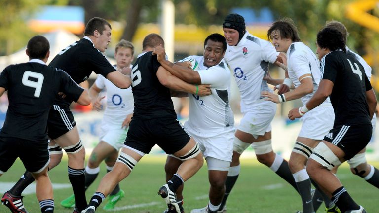 Mako Vunipola of England is tackled by Brad Shields of New Zealand during the 2011 IRB Junior World Championship Final