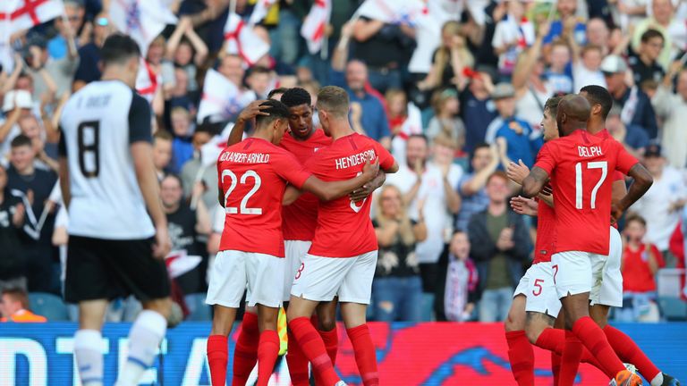 Marcus Rashford celebrates putting England ahead against Costa Rica