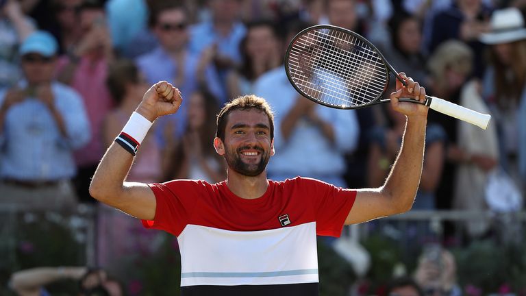 Marin Cilic of Croatia celebrates winning the Fever-Tree Championships after defeating Novak Djokovic of Serbia at Queens Club on June 24, 2018 in London, United Kingdom. (