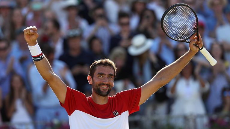 Marin Cilic of Croatia celebrates winning the Fever-Tree Championships after defeating Novak Djokovic of Serbia at Queens Club on June 24, 2018 in London, United Kingdom