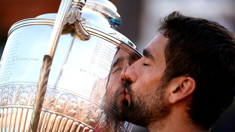 Marin Cilic of Croatia celebrates with the trophy after defeating Novak Djokovic of Serbia in the final of the the Fever-Tree Championships at Queens Club on June 24, 2018 in London, United Kingdom