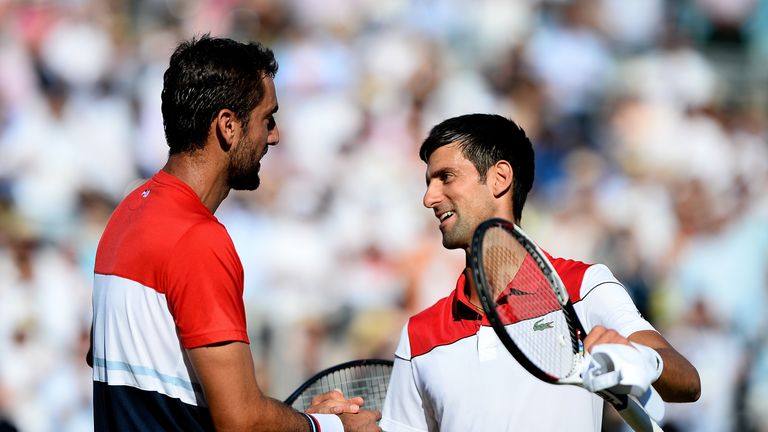 Marin Cilic of Croatia and Novak Djokovic of Serbia shake hands following the final of the the Fever-Tree Championships at Queens Club on June 24, 2018 in London, United Kingdom