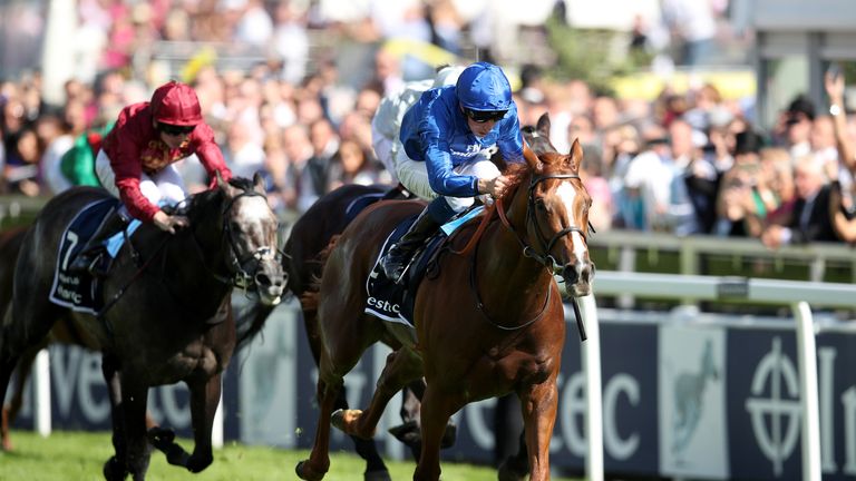 Masar ridden by jockey William Buick coming home to win the Investec Derby 