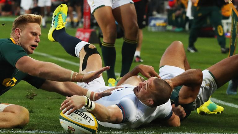 Mike Brown scores England's opening try against South Africa at Ellis Park