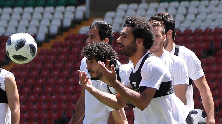 Egypt's forward Mohamed Salah (R) is seen during a training at the Akhmat Arena stadium in Grozny on June 13, 2018, ahead of the Russia 2018 World Cup football tournament. (Photo by KARIM JAAFAR / AFP) (Photo credit should read KARIM JAAFAR/AFP/Getty Images)