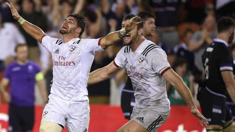 USA Eagles' Nate Ausperger, left, and Cam Dolan celebrate the team's 30-29 win over Scotland in an exhibition rugby match, Saturday, June 16, 2018, in Houston. 