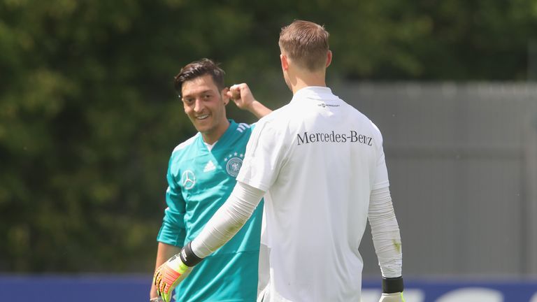Manuel Neuer and Mesut Ozil during a Germany training session