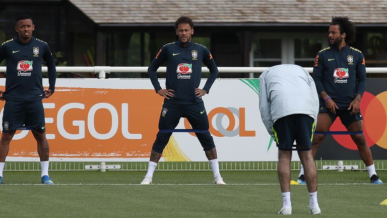 Marcelo (right) linked up with Neymar at Brazil's training camp in England this week
